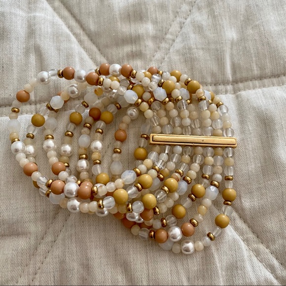 MULTI STRAND BEAD BRACELET IN WHITE TAN AND GOLD - Picture 3 of 7